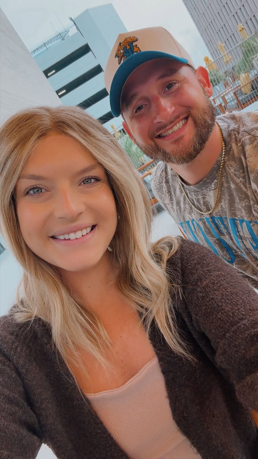 Kristin and her husband smiling together