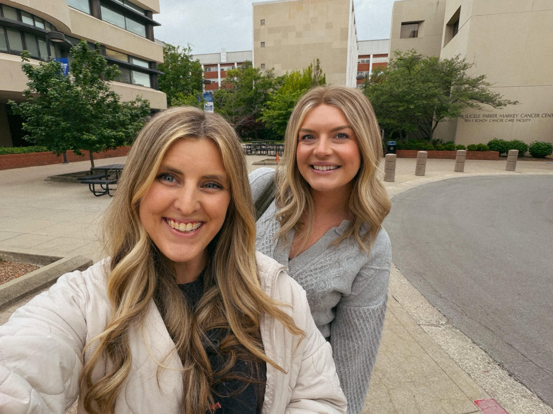 Kristin with a friend outside the cancer center